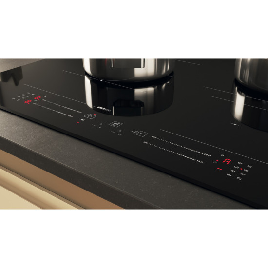 Whirlpool WF S4665 CPBF beépíthető indukciós kerámialap, 65x51x5.4 cm, fekete szín 